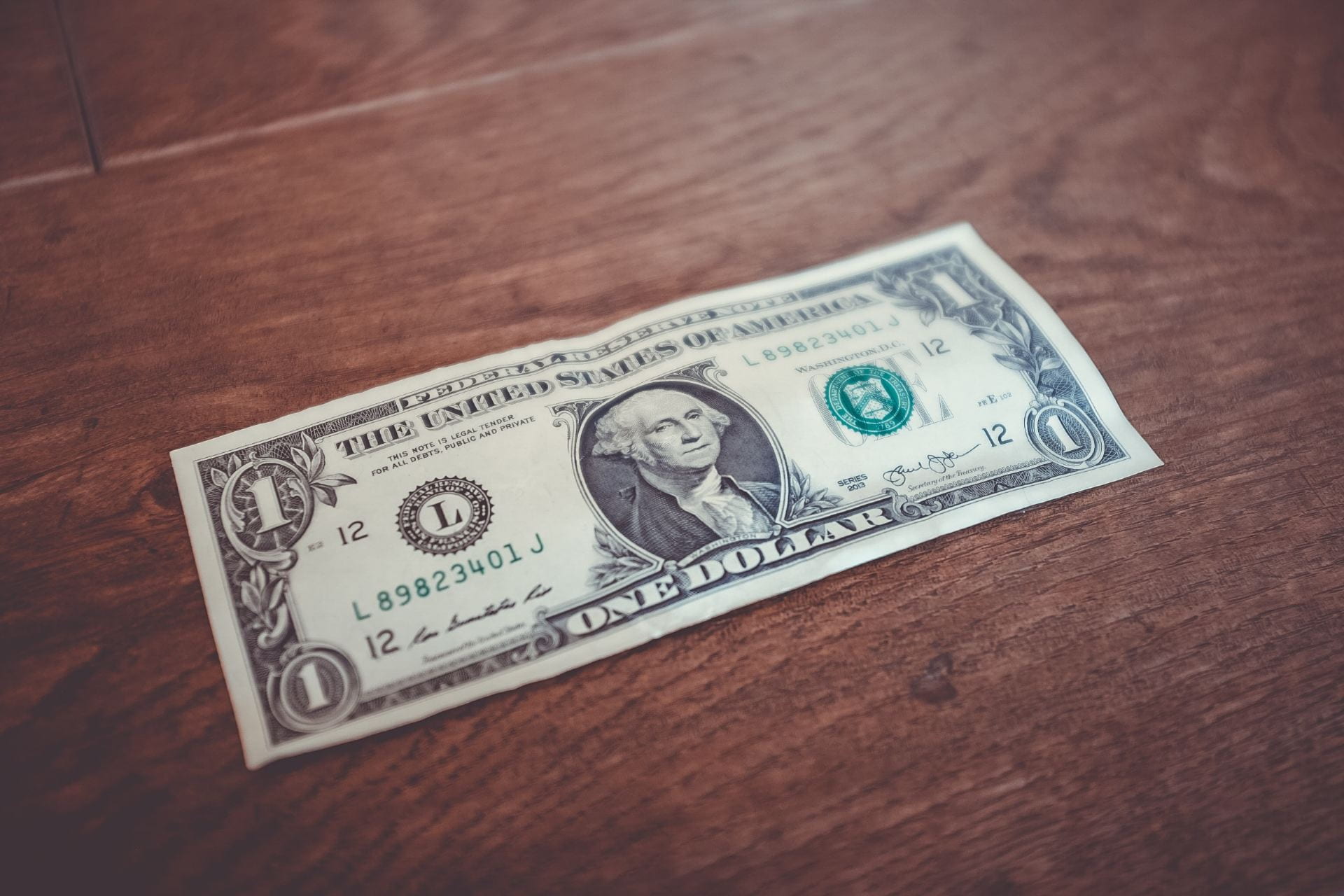 dollar bill on a table